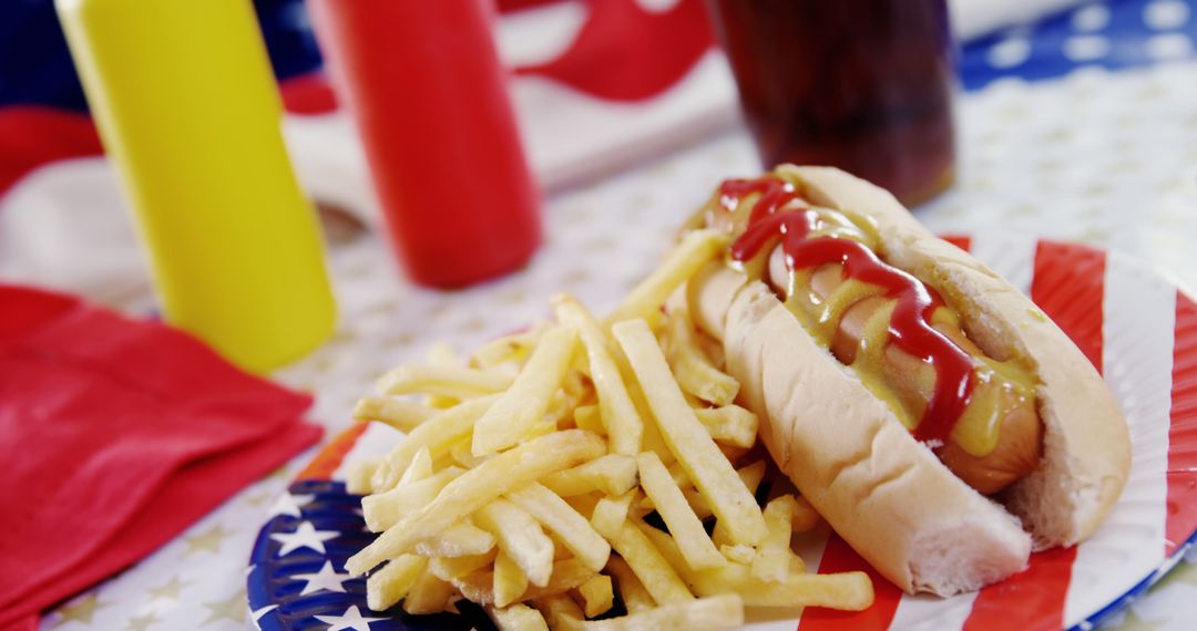 Classic American Hotdog with Fries at Patriotic Picnic - Free Images, Stock Photos and Pictures on Pikwizard.com