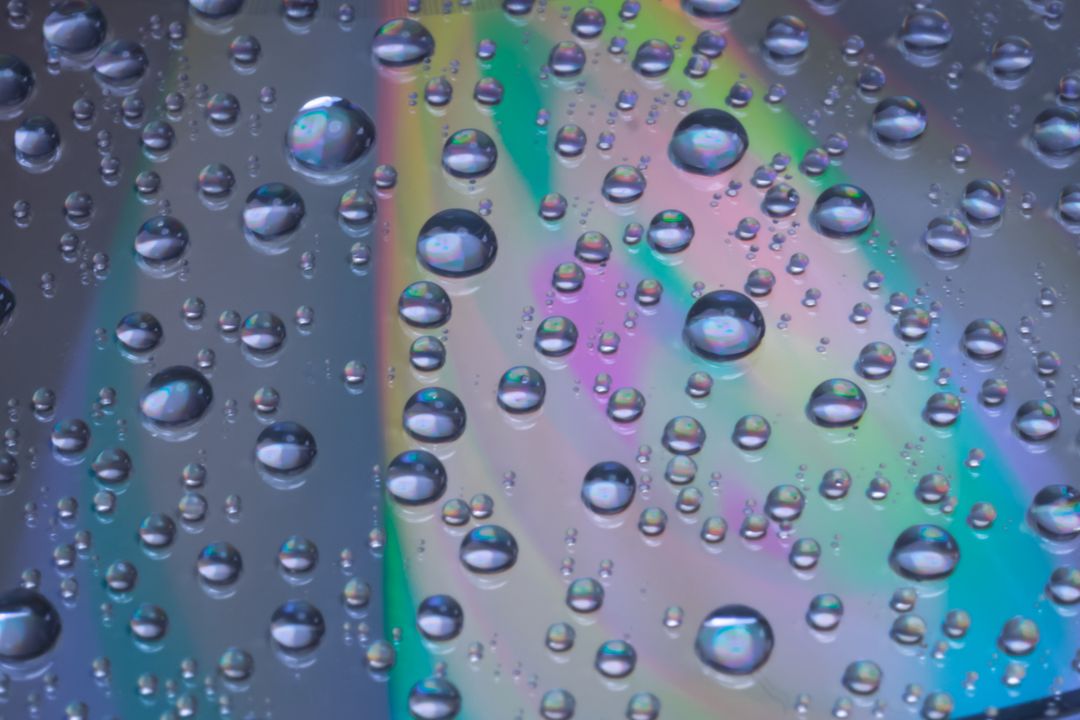 Close-up of Water Droplets on Colorful Surface - Free Images, Stock Photos and Pictures on Pikwizard.com