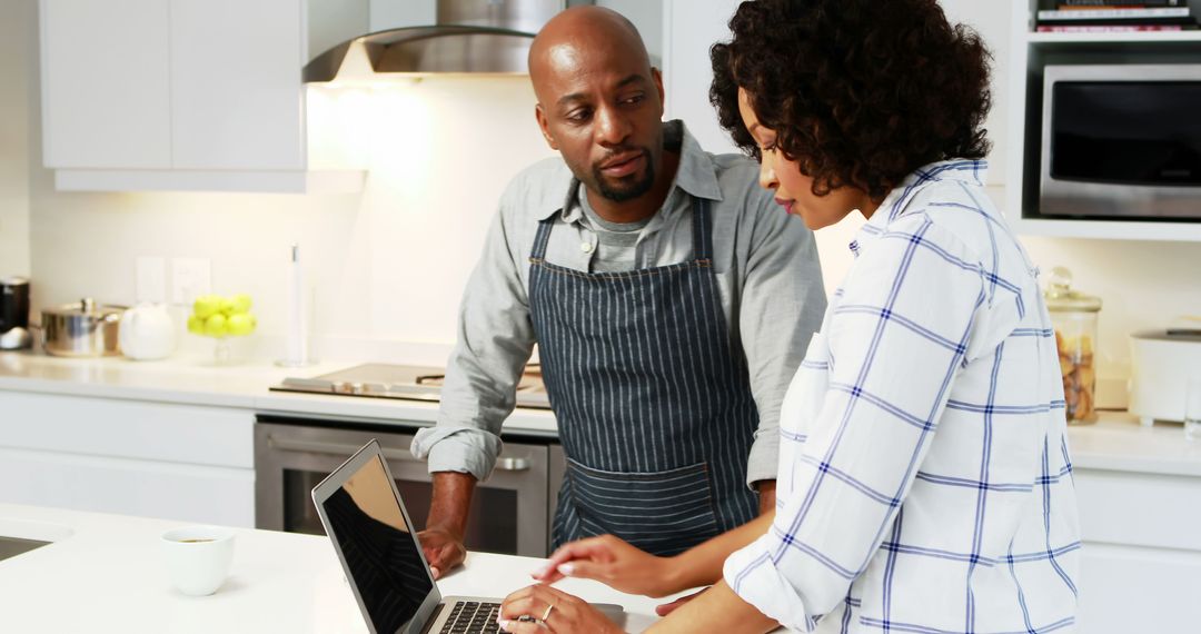 African American Couple Collaborating in Modern Kitchen