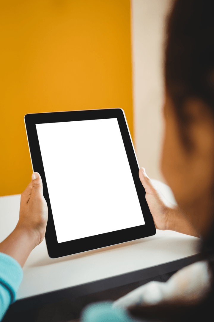 Child Engaged With Transparent Digital Tablet Screen