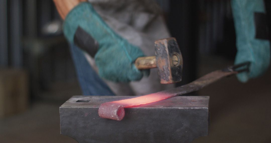 Blacksmith Crafting Hot Metal on Anvil with Hammer - Free Images, Stock Photos and Pictures on Pikwizard.com