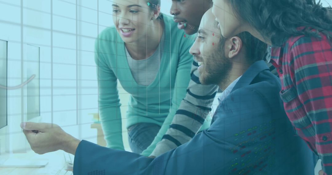 Diverse Business Team Analyzing Financial Data on Monitor