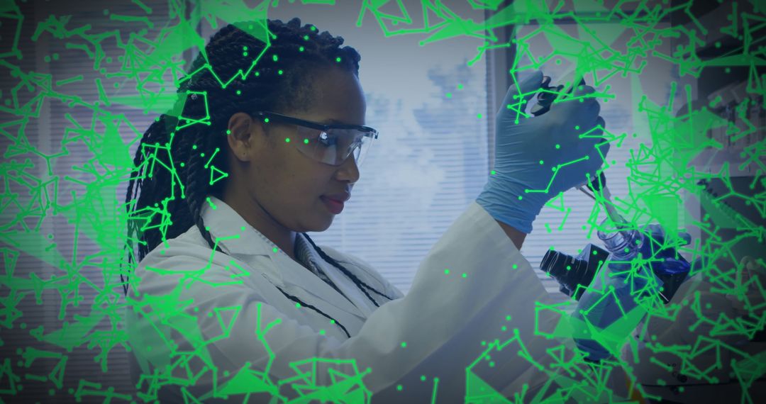 African American Female Scientist Analyzing Data in Laboratory
