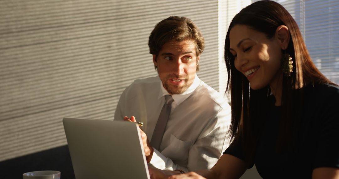 Colleagues Collaborating in Bright Modern Office Enviroment