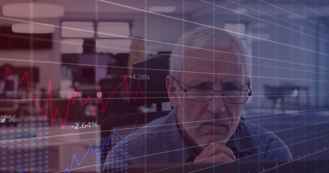 Analytical Businessman Analyzing Data in Office