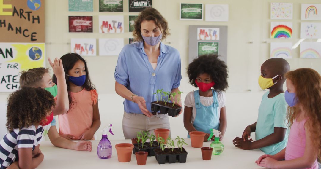 Teacher Engages Kids with Planting Activity in Classroom - Free Images, Stock Photos and Pictures on Pikwizard.com