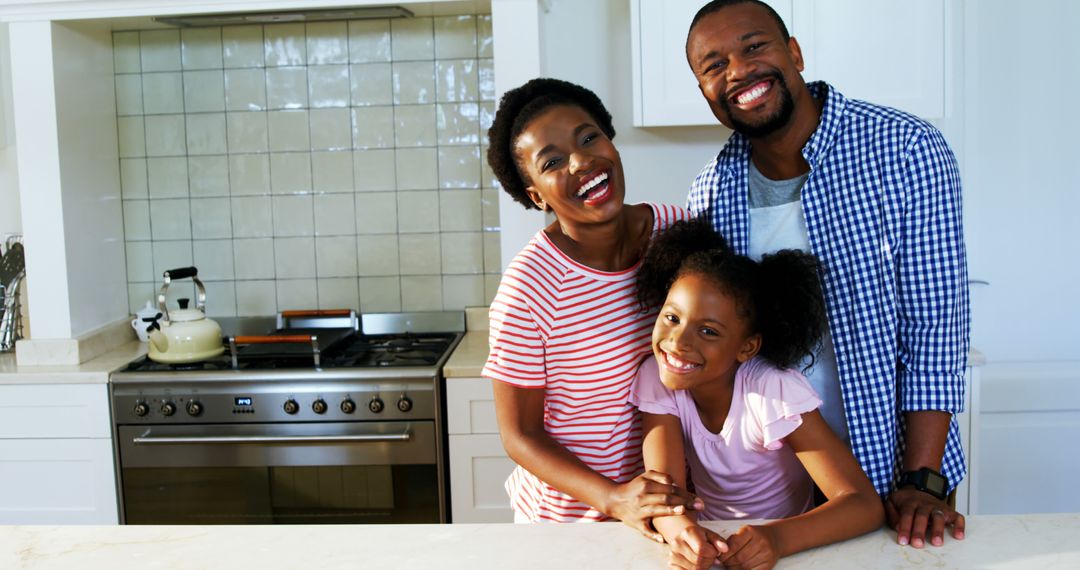 Happy African American Family Smiling in Modern Kitchen - Free Images, Stock Photos and Pictures on Pikwizard.com