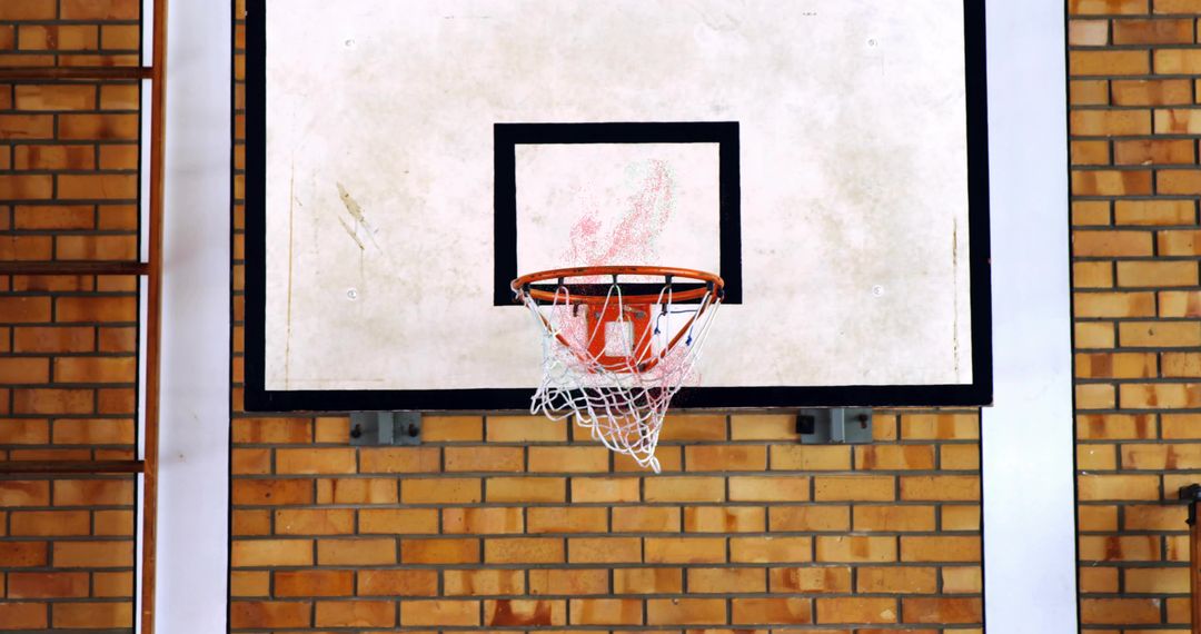 Basketball Backboard and Net in Urban Gymnasium Setting