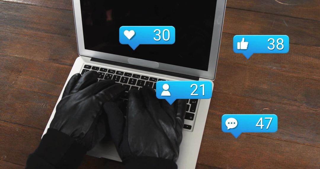 Anonymous User Typing on Laptop with Social Media Notifications