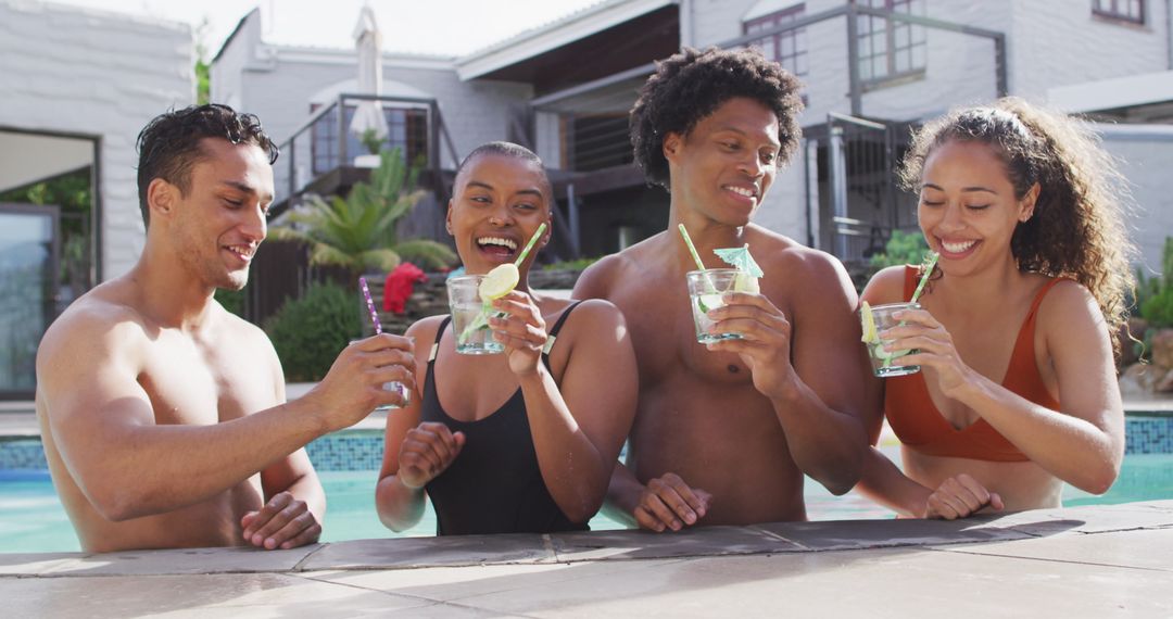 Friends Toasting and Laughing by Poolside