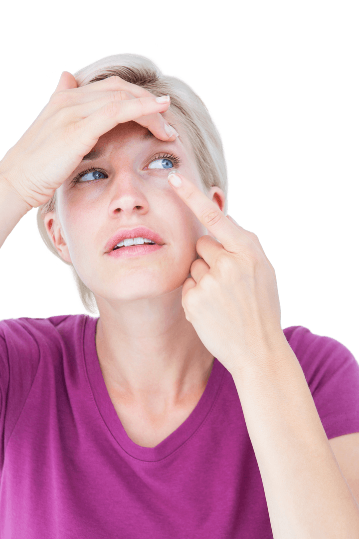 Blonde Woman Applying Transparent Contact Lens Up Close