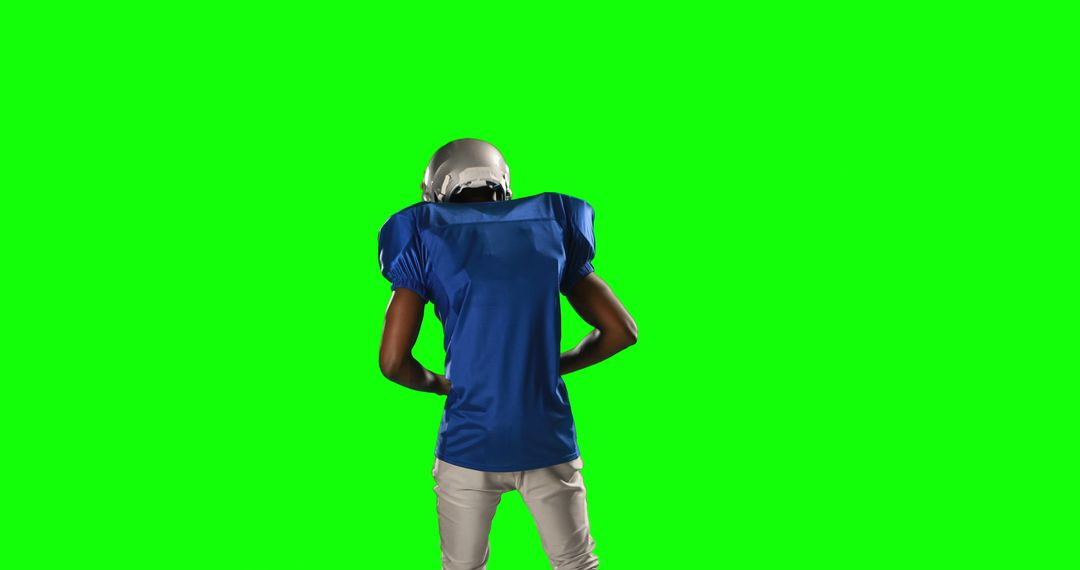 Football Player in Blue Jersey Warming Up Against Green Screen - Free Images, Stock Photos and Pictures on Pikwizard.com