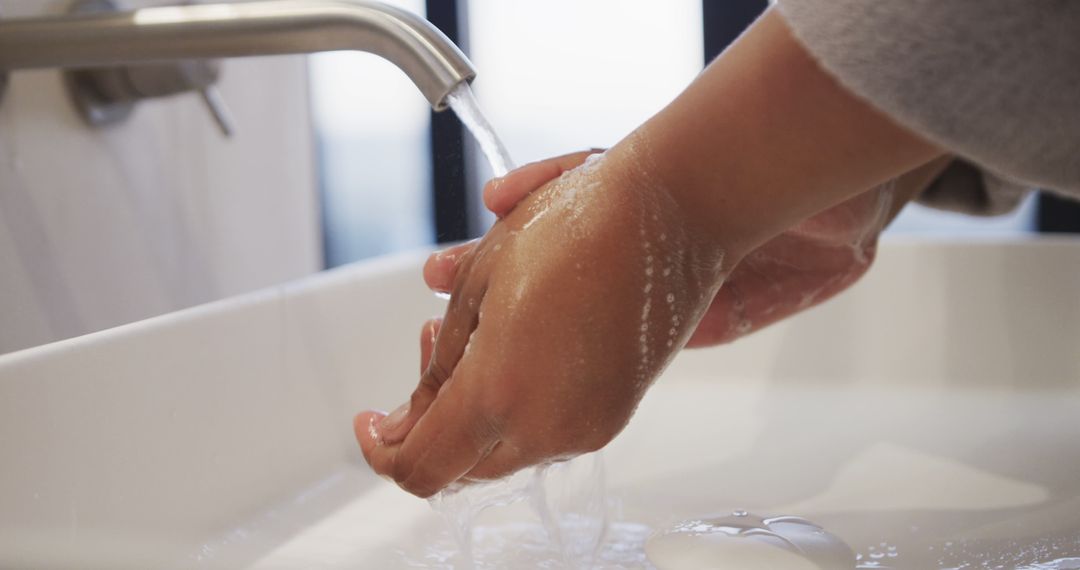 Close-up of Person Washing Hands with Soap and Water in Sink - Free Images, Stock Photos and Pictures on Pikwizard.com