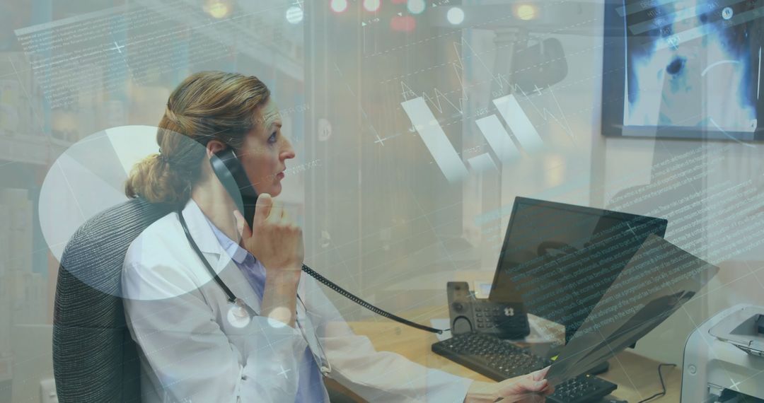 Medical Doctor Analyzing Data on Computer Call