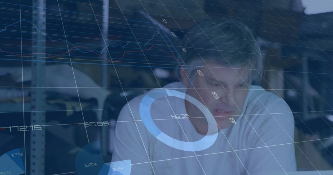 Businessman Analyzing Financial Data with Futuristic Interface