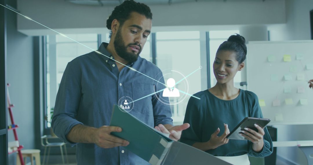 Diverse Business Team Engaging with Digital Technology in Office