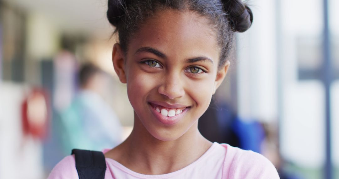 Smiling African American Girl with Backpack in School Hallway - Free Images, Stock Photos and Pictures on Pikwizard.com