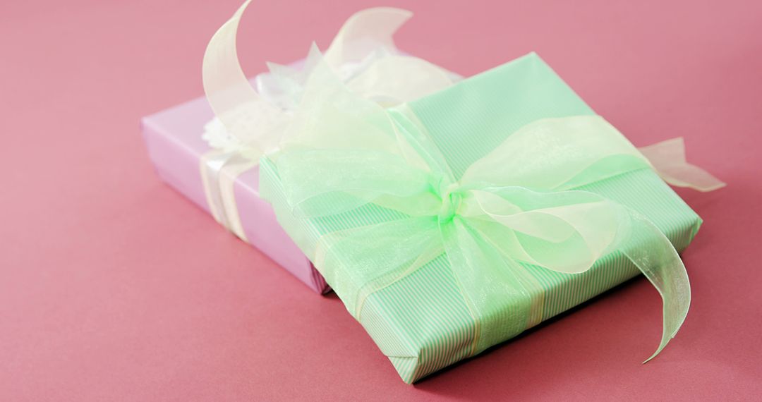 Elegant Gift Boxes with Ribbon on Pink Background - Free Images, Stock Photos and Pictures on Pikwizard.com