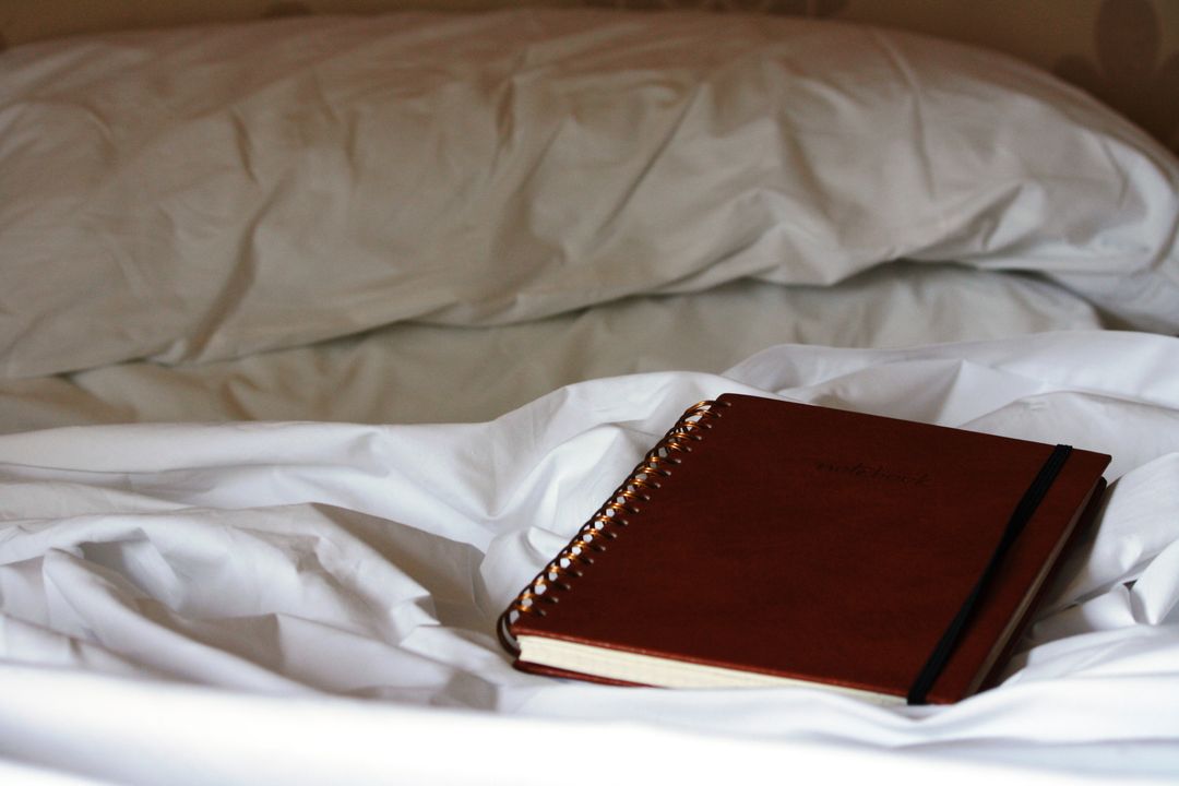Bed daily notebook reflection - Free Images, Stock Photos and Pictures on Pikwizard.com