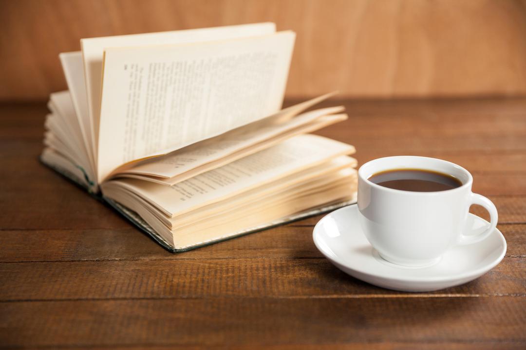 Open Book and Coffee Cup on Wooden Table - Free Images, Stock Photos and Pictures on Pikwizard.com