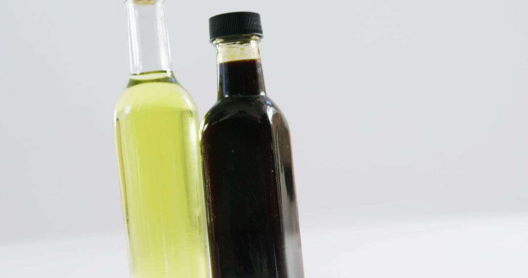 Olive and Balsamic Vinegar Bottles on Plain Background - Free Images, Stock Photos and Pictures on Pikwizard.com