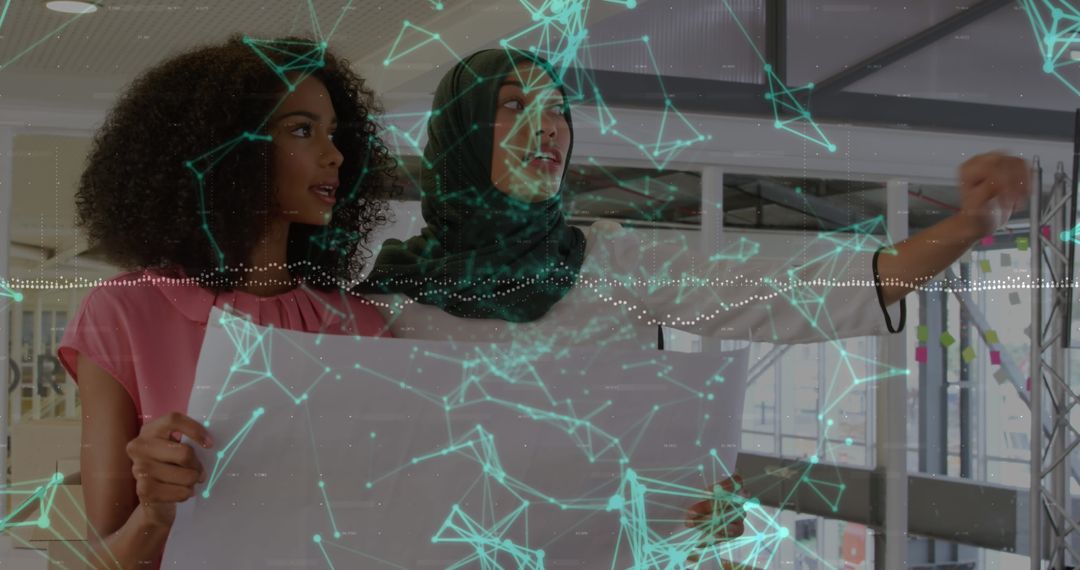 Architects Collaborate in High-Tech Studio with Blueprint and Projections