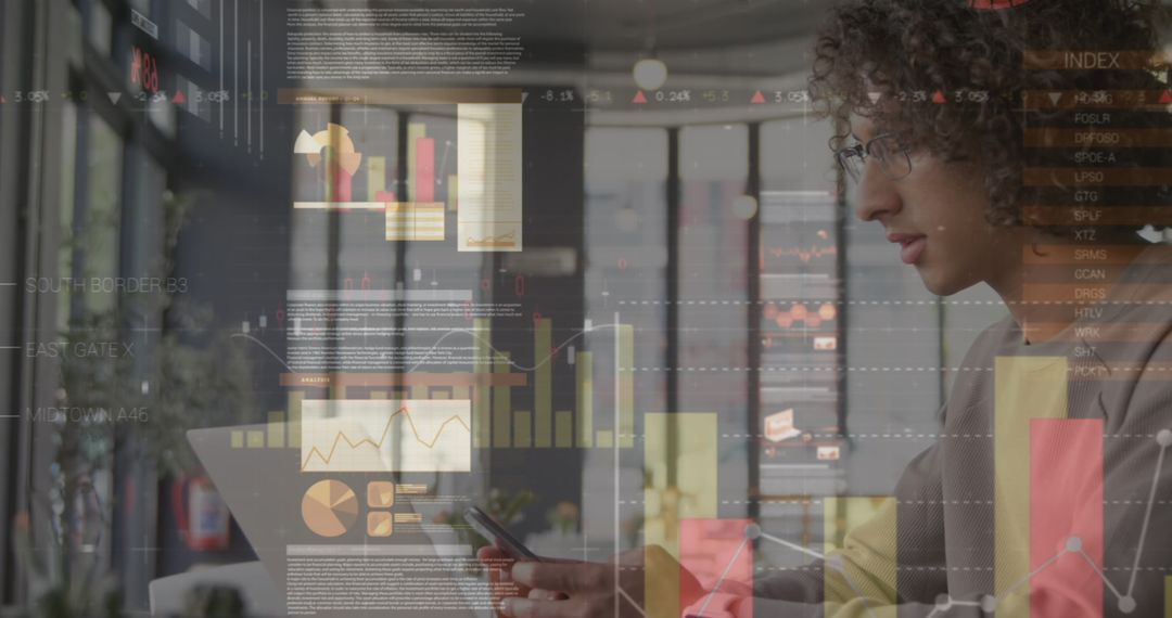 Focused Man Analyzing Financial Data Visualization on Laptop