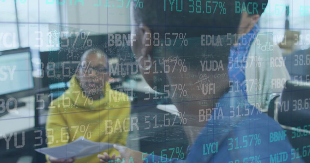 Diverse Team Analyzing Financial Data on Transparent Screen