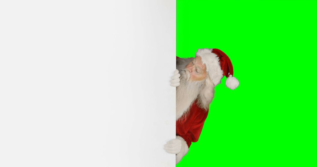 Santa Claus Peering Around Blank Screen on Green Background - Free Images, Stock Photos and Pictures on Pikwizard.com