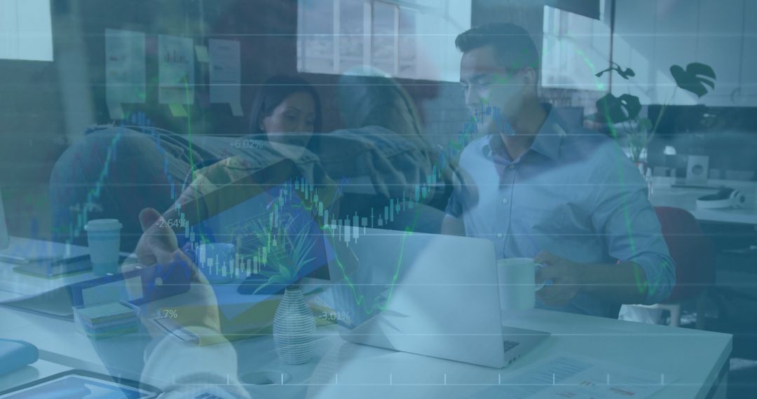 Colleagues Analyzing Financial Trends in a Modern Office Environment