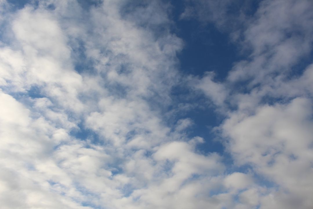 Beautiful Blue Sky with Fluffy White Clouds - Free Images, Stock Photos and Pictures on Pikwizard.com