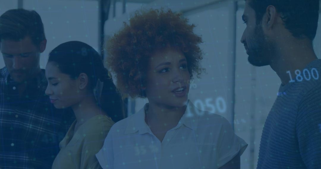 Colleagues Collaborating with Futuristic Digital Data Overlay