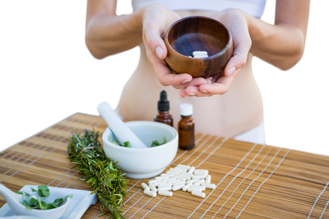 Transparent Fit Woman Showing Bowl of Pills Near Natural Herbs - Download Free Stock Images Pikwizard.com