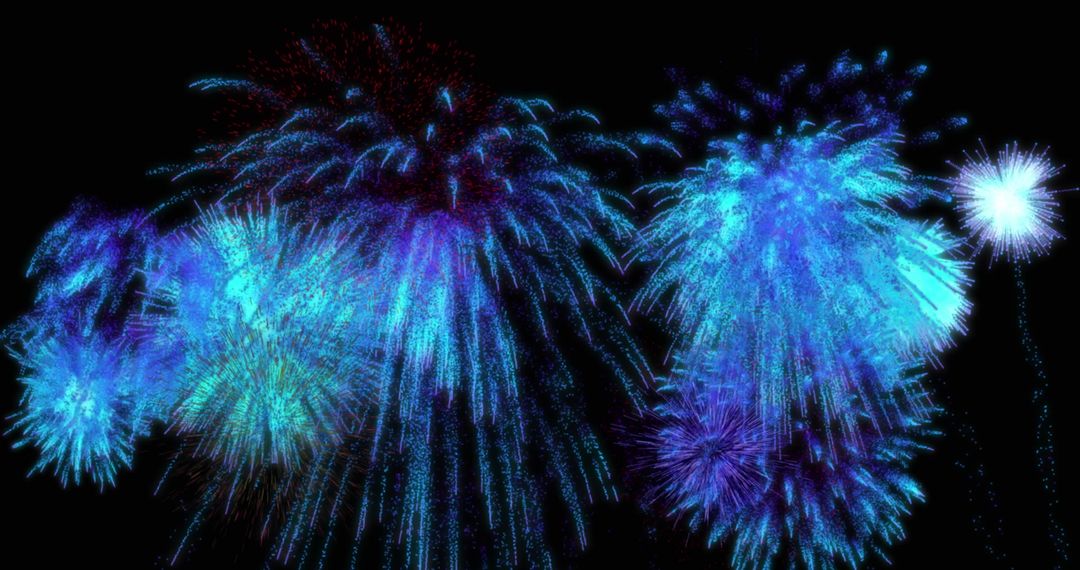 Vibrant Blue Fireworks Display Exploding Against Night Sky