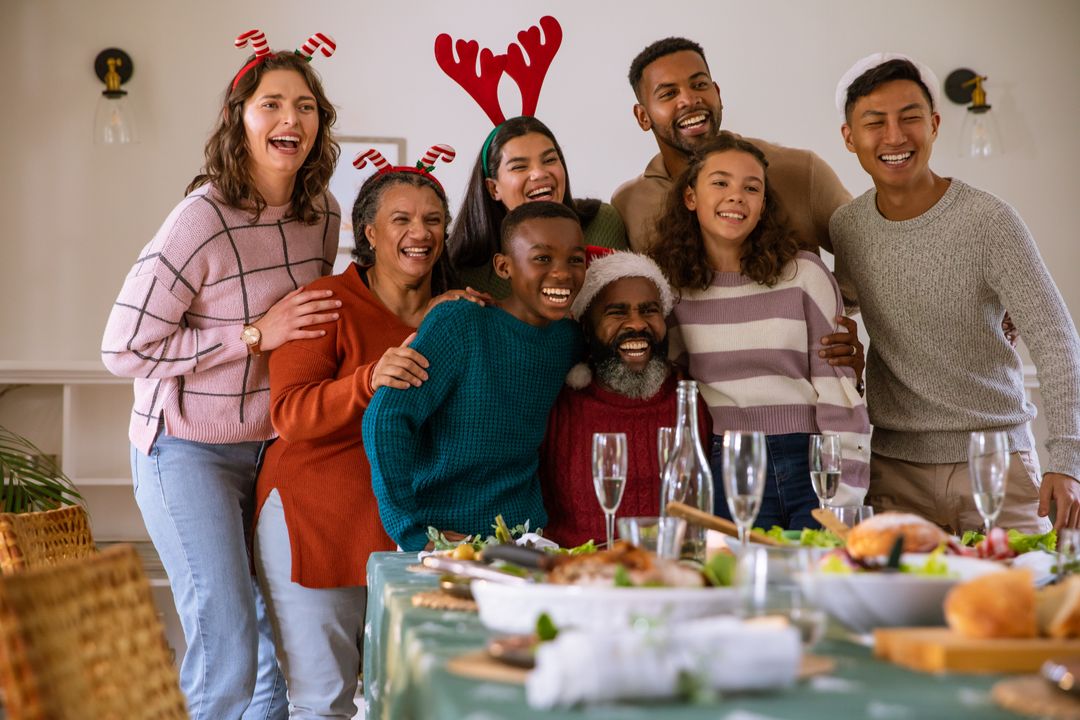Diverse Family Celebrating Christmas Around Table with Joyful Atmosphere