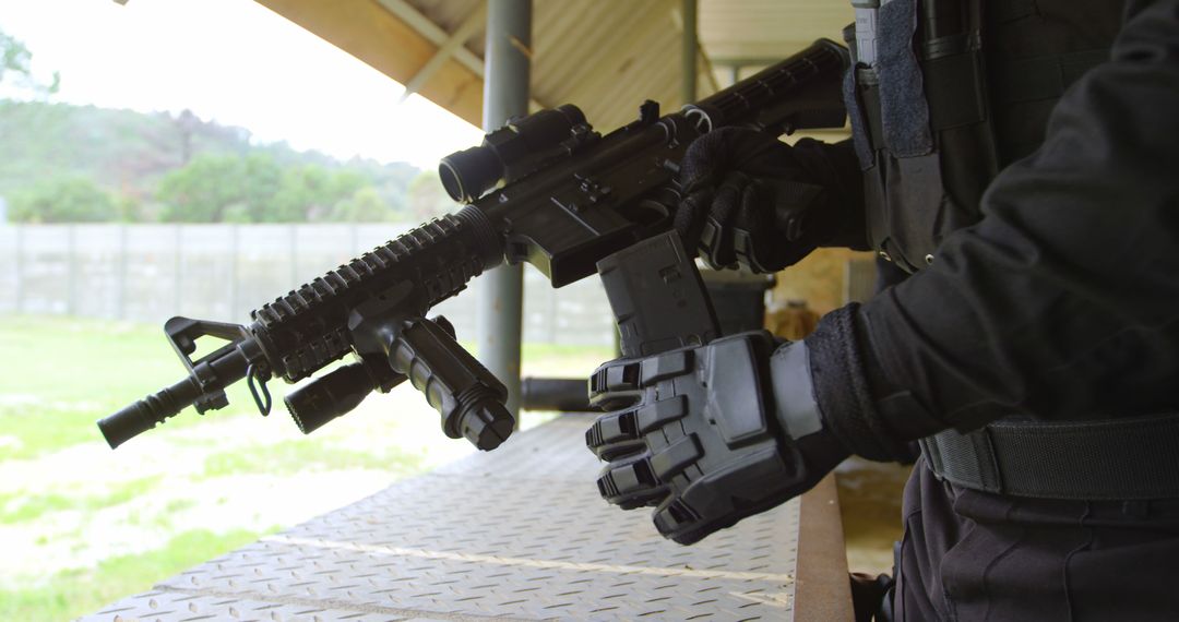 Soldier in Action: Loading Rifle Magazine During Training