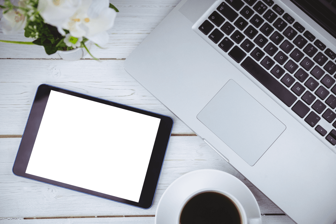 Computing devices on desk with transparent background