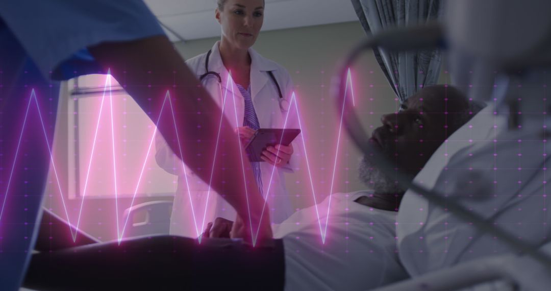 Doctor Discussing with Patient in Hospital Monitoring Heart Rate