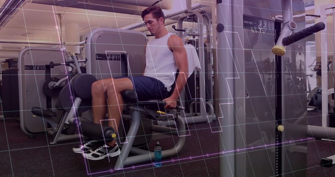 Man Engaging in Leg Exercises on Extension Machine at Gym