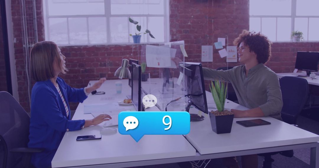 Colleagues Communicate in Modern Office with Digital Interaction