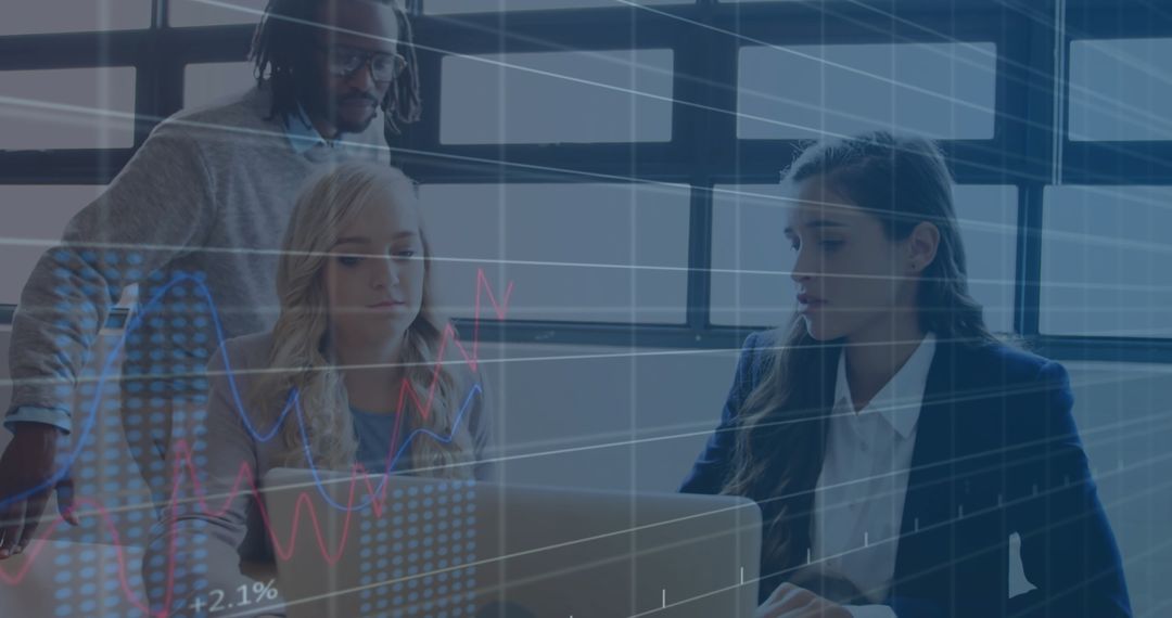 Team Analyzing Financial Data and Discussing Strategies in Modern Office