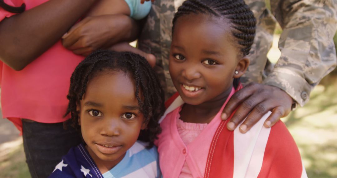 Smiling African American Children Hugging Parents Outdoors - Free Images, Stock Photos and Pictures on Pikwizard.com