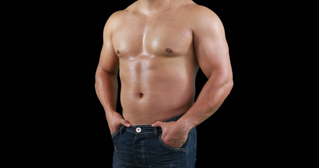 Fit Shirtless Man Posing with Hands in Jeans Pockets Against Black Background - Free Images, Stock Photos and Pictures on Pikwizard.com