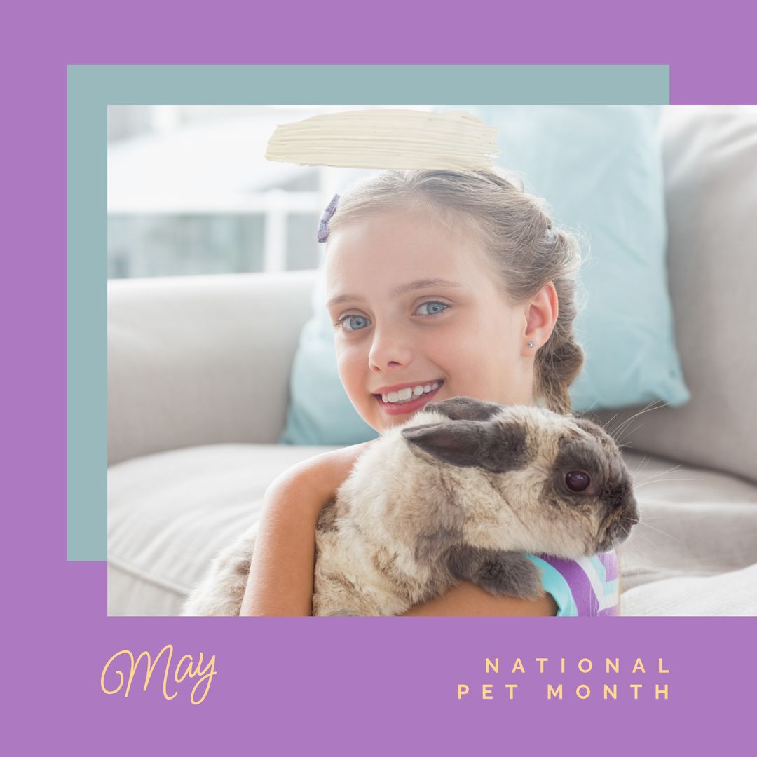Smiling Girl Enjoying National Pet Month with Her Rabbit