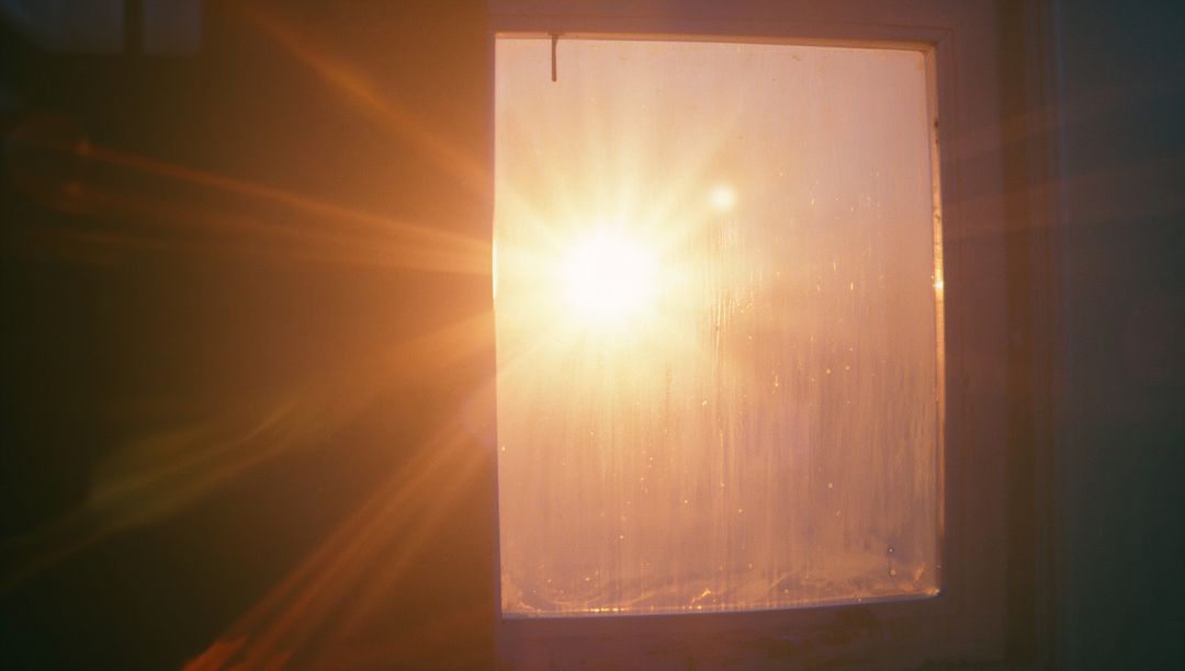 Sunlight Streaming Through Window with Lens Flares
