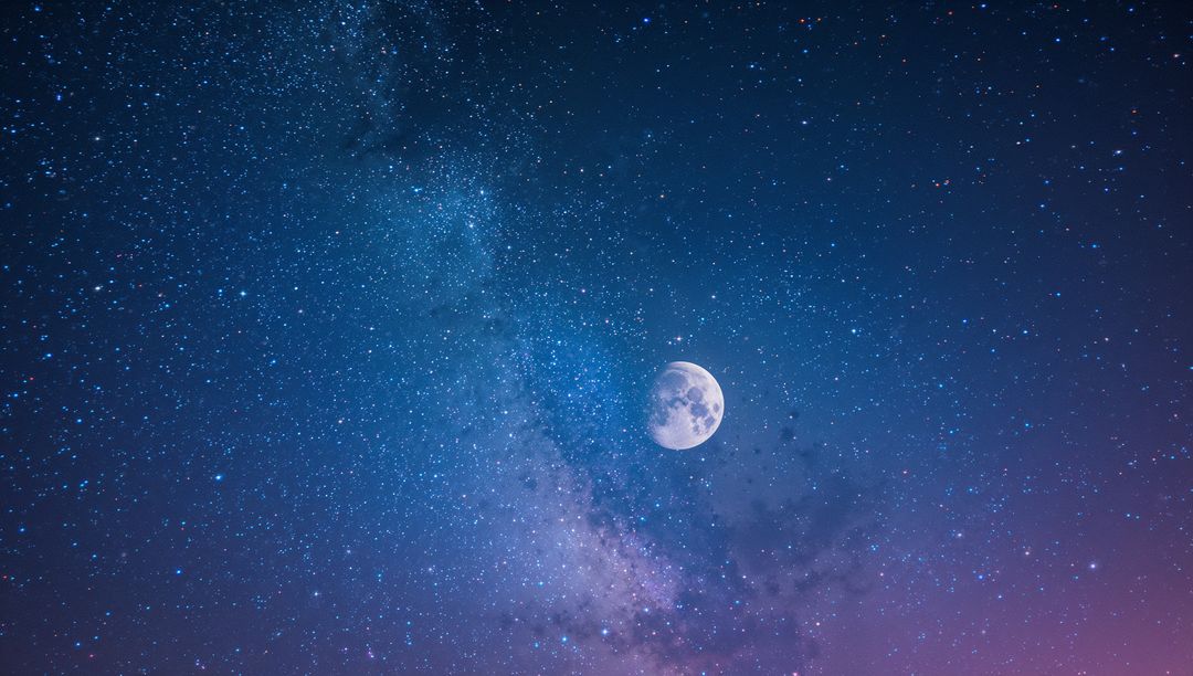Mysterious Night Sky with Glowing Moon and Milky Way Galaxy