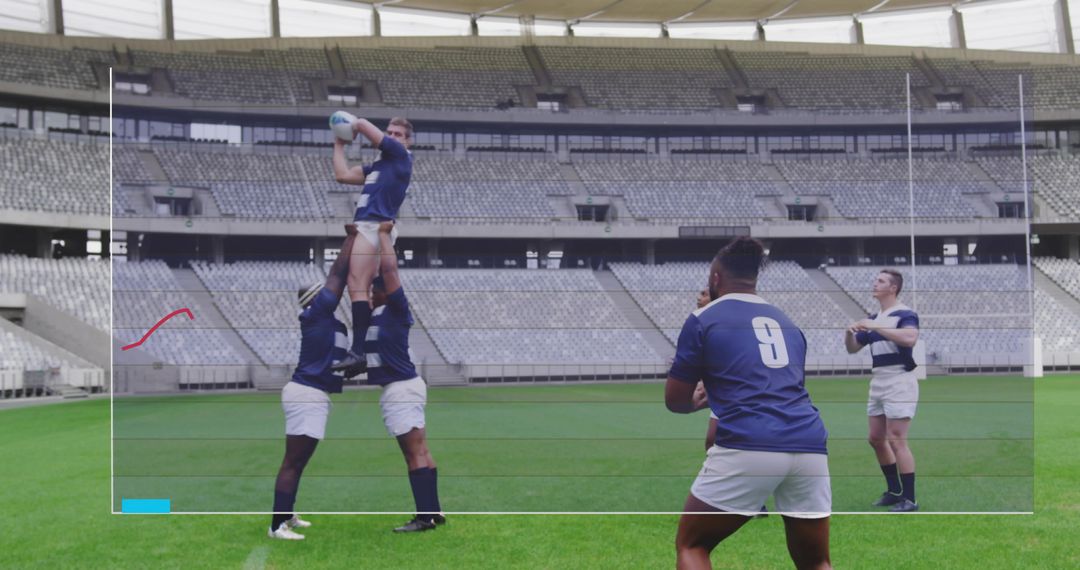 Rugby lineout lifting catching ball in empty stadium highlighting teamwork and power