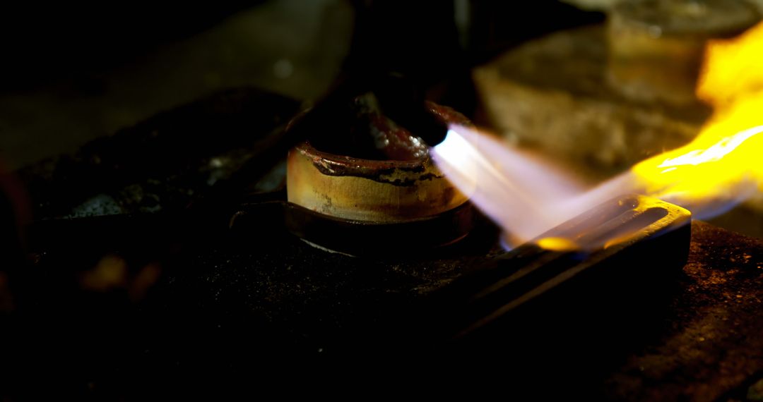 Lively Metalworking Process with Blowtorch And Molten Metal From Crucible - Free Images, Stock Photos and Pictures on Pikwizard.com