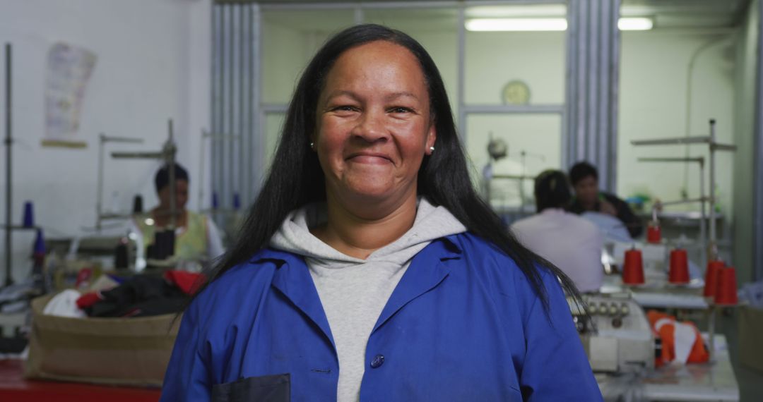 Confident Biracial Woman in Industrial Factory Environment - Free Images, Stock Photos and Pictures on Pikwizard.com