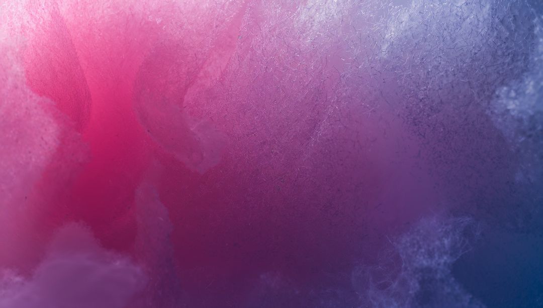 Dreamy pink to blue gradient with soft grain and ethereal texture for modern backgrounds